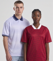Two people wearing patterned shirts against a plain background